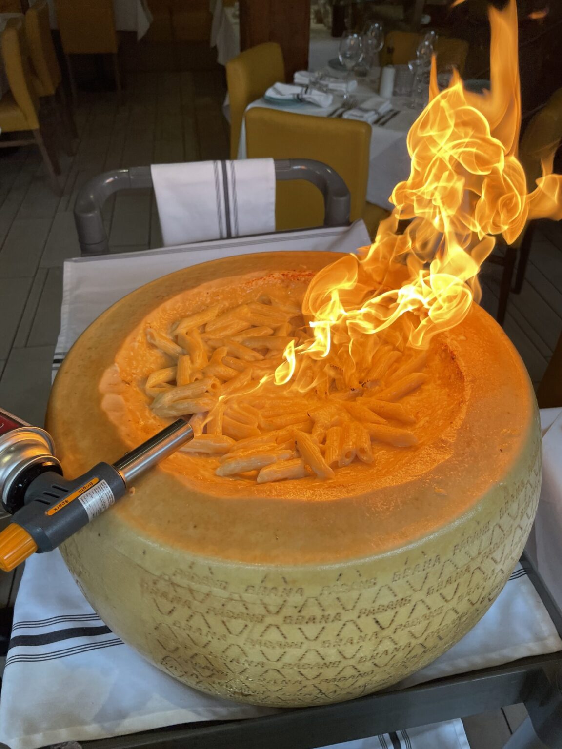This Italian restaurant is making pasta in a giant wheel of cheese
